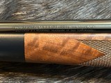 NEW WINCHESTER MODEL 70 SUPER GRADE 338 WIN MAG 26