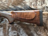 NEW WINCHESTER MODEL 70 SUPER GRADE 338 WIN MAG 26