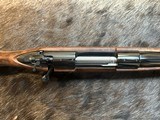 NEW WINCHESTER MODEL 70 SUPER GRADE 338 WIN MAG 26