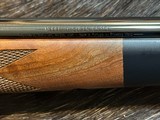 NEW WINCHESTER MODEL 70 SUPER GRADE 338 WIN MAG 26