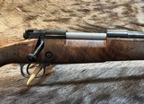 NEW WINCHESTER MODEL 70 SUPER GRADE 338 WIN MAG 26