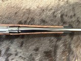 NEW WINCHESTER MODEL 70 SUPER GRADE 338 WIN MAG 26
