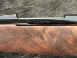 NEW WINCHESTER MODEL 70 SUPER GRADE 338 WIN MAG 26