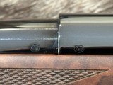 NEW WINCHESTER MODEL 70 SUPER GRADE 338 WIN MAG 26