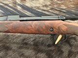 NEW WINCHESTER MODEL 70 SUPER GRADE 338 WIN MAG 26