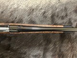 NEW WINCHESTER MODEL 70 SUPER GRADE 338 WIN MAG 26