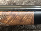 NEW WINCHESTER MODEL 70 SUPER GRADE 338 WIN MAG 26