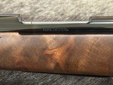 NEW WINCHESTER MODEL 70 SUPER GRADE 338 WIN MAG 26