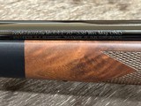 NEW WINCHESTER MODEL 70 SUPER GRADE 338 WIN MAG 26