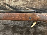 NEW WINCHESTER MODEL 70 SUPER GRADE 338 WIN MAG 26