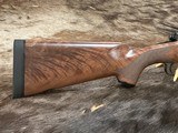 NEW WINCHESTER MODEL 70 SUPER GRADE 338 WIN MAG 26