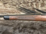 NEW WINCHESTER MODEL 70 SUPER GRADE 338 WIN MAG 26