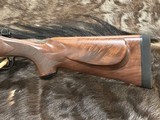 NEW WINCHESTER MODEL 70 SUPER GRADE 338 WIN MAG 26