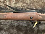NEW WINCHESTER MODEL 70 SUPER GRADE 338 WIN MAG 26