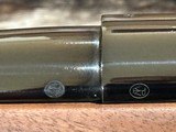 NEW WINCHESTER MODEL 70 SUPER GRADE 338 WIN MAG 26