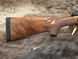 NEW WINCHESTER MODEL 70 SUPER GRADE 338 WIN MAG 26