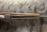 NEW WINCHESTER MODEL 70 SUPER GRADE 338 WIN MAG 26