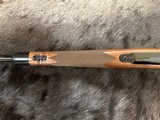 NEW WINCHESTER MODEL 70 SUPER GRADE 338 WIN MAG 26