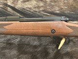 NEW WINCHESTER MODEL 70 SUPER GRADE 338 WIN MAG 26
