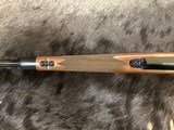 NEW WINCHESTER MODEL 70 SUPER GRADE 338 WIN MAG 26