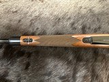 NEW WINCHESTER MODEL 70 SUPER GRADE 338 WIN MAG 26
