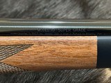 NEW WINCHESTER MODEL 70 SUPER GRADE 338 WIN MAG 26