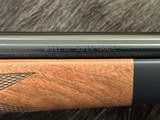 NEW WINCHESTER MODEL 70 SUPER GRADE 338 WIN MAG 26