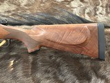 NEW WINCHESTER MODEL 70 SUPER GRADE 338 WIN MAG 26