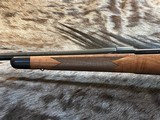 NEW WINCHESTER MODEL 70 SUPER GRADE 338 WIN MAG 26