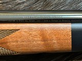 NEW WINCHESTER MODEL 70 SUPER GRADE 338 WIN MAG 26