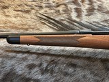 NEW WINCHESTER MODEL 70 SUPER GRADE 338 WIN MAG 26