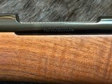 NEW WINCHESTER MODEL 70 SUPER GRADE 338 WIN MAG 26