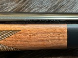 NEW WINCHESTER MODEL 70 SUPER GRADE 338 WIN MAG 26