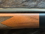 NEW WINCHESTER MODEL 70 SUPER GRADE 338 WIN MAG 26