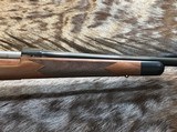 NEW WINCHESTER MODEL 70 SUPER GRADE 338 WIN MAG 26