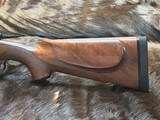NEW WINCHESTER MODEL 70 SUPER GRADE 338 WIN MAG 26