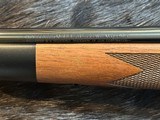NEW WINCHESTER MODEL 70 SUPER GRADE 338 WIN MAG 26