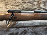 NEW WINCHESTER MODEL 70 SUPER GRADE 338 WIN MAG 26
