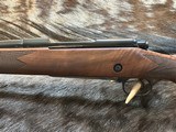 NEW WINCHESTER MODEL 70 SUPER GRADE 338 WIN MAG 26