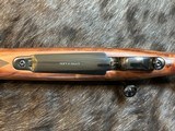 NEW WINCHESTER MODEL 70 SUPER GRADE 338 WIN MAG 26