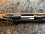 NEW WINCHESTER MODEL 70 SUPER GRADE 338 WIN MAG 26