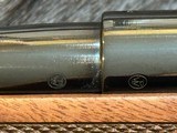 NEW WINCHESTER MODEL 70 SUPER GRADE 338 WIN MAG 26