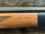 NEW WINCHESTER MODEL 70 SUPER GRADE 338 WIN MAG 26