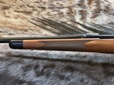 NEW WINCHESTER MODEL 70 SUPER GRADE 338 WIN MAG 26