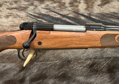 NEW WINCHESTER MODEL 70 FEATHERWEIGHT 25-06 REMINGTON 22