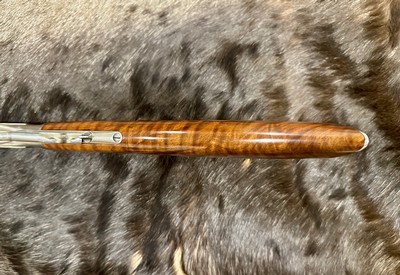 EXHIBITION, HAND-ENGRAVED UBERTI 1873 WINCHESTER IN THE WHITE SPORTING 45 COLT 20