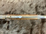 EXHIBITION, HAND-ENGRAVED UBERTI 1873 WINCHESTER IN THE WHITE SPORTING 45 COLT 20