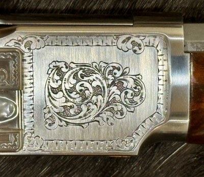 EXHIBITION, HAND-ENGRAVED UBERTI 1873 WINCHESTER IN THE WHITE SPORTING 45 COLT 20