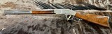 EXHIBITION, HAND-ENGRAVED UBERTI 1873 WINCHESTER IN THE WHITE SPORTING 45 COLT 20