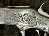 EXHIBITION, HAND-ENGRAVED UBERTI 1873 WINCHESTER IN THE WHITE SPORTING 45 COLT 20
